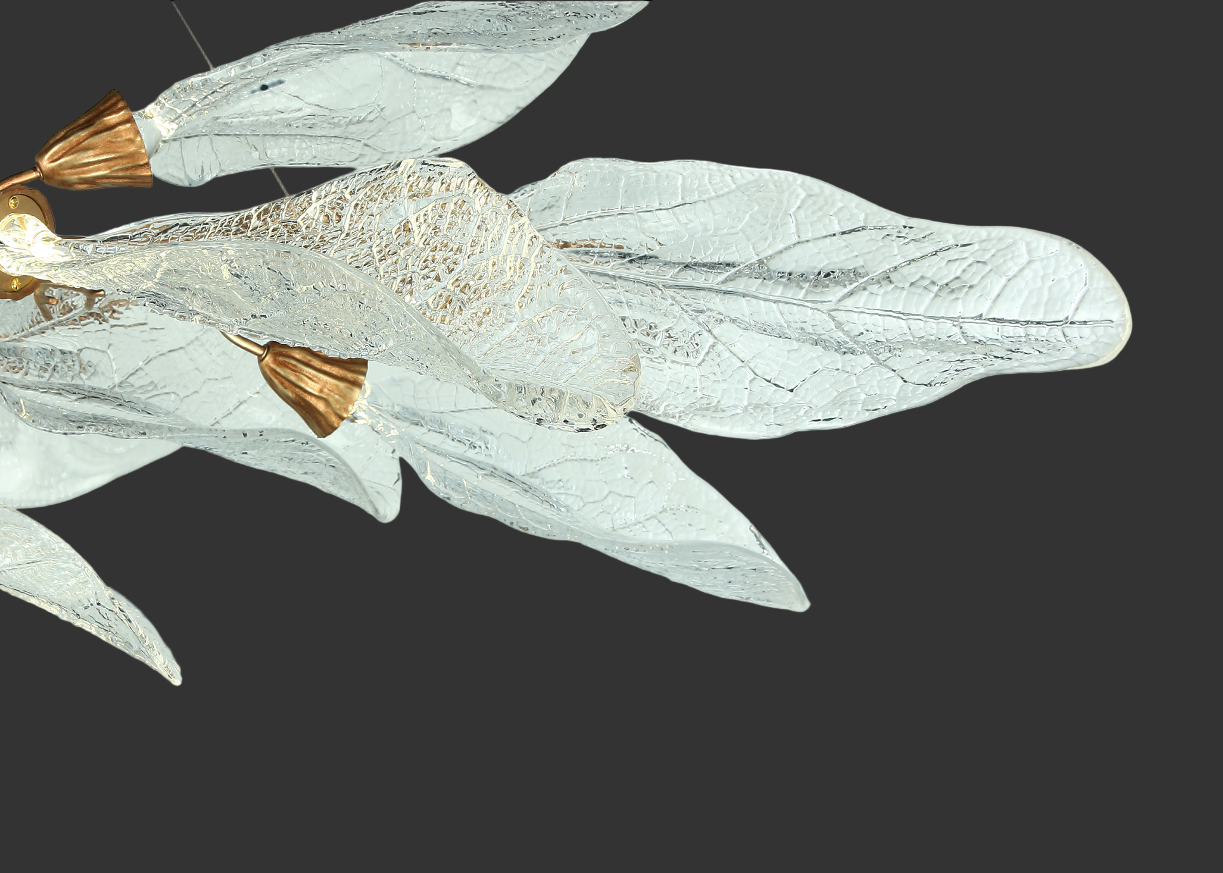 Close up of elongated textured glass leaf elements on VORELLI® Ottobre rectangular chandelier