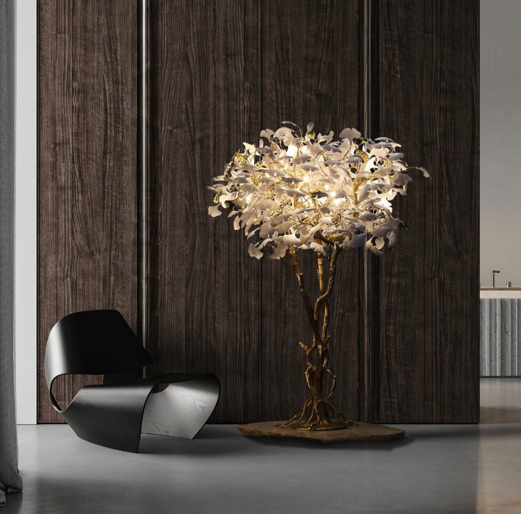 Prano floor lamp by VORELLI with sculptural floral glass and branch design in a luxury living space