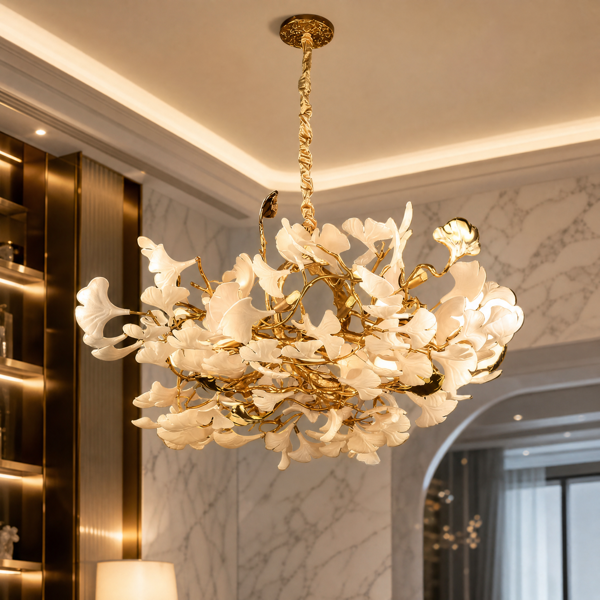 Detailed close-up of the delicate, handcrafted white porcelain petals arranged around the elegant metallic branching frame of the VORELLI Prano pendant light.