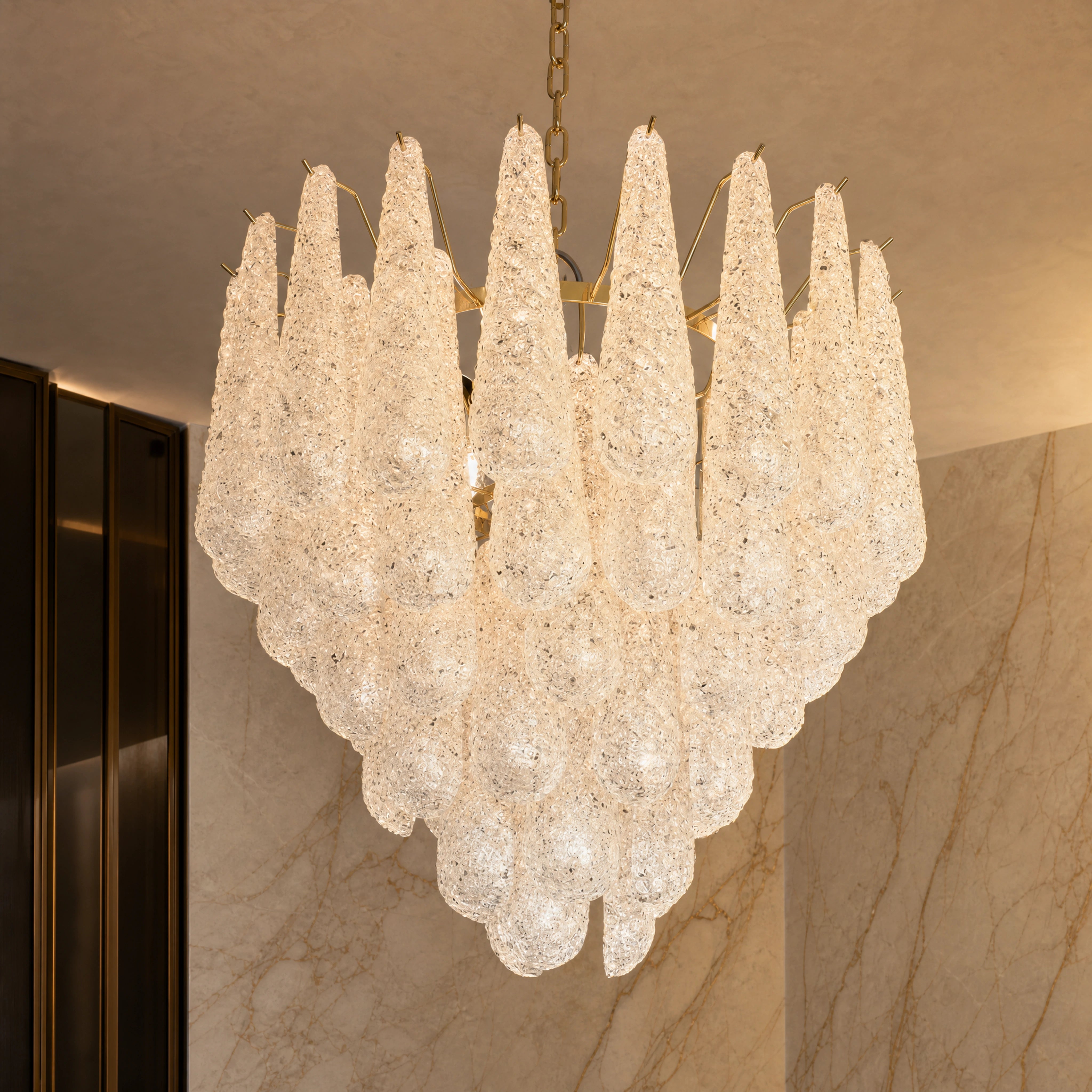 Ravello Conchiglie Murano Shell Glass Staircase Chandelier close-up luxury lifestyle hero image by VORELLI