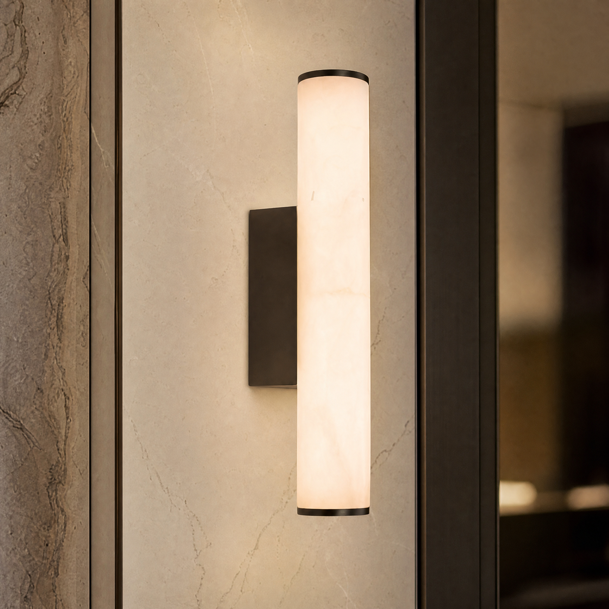 A detailed closeup of the Sarrano Alabaster Wall Light showing the unique natural stone grain variation and premium brass finish backplate.