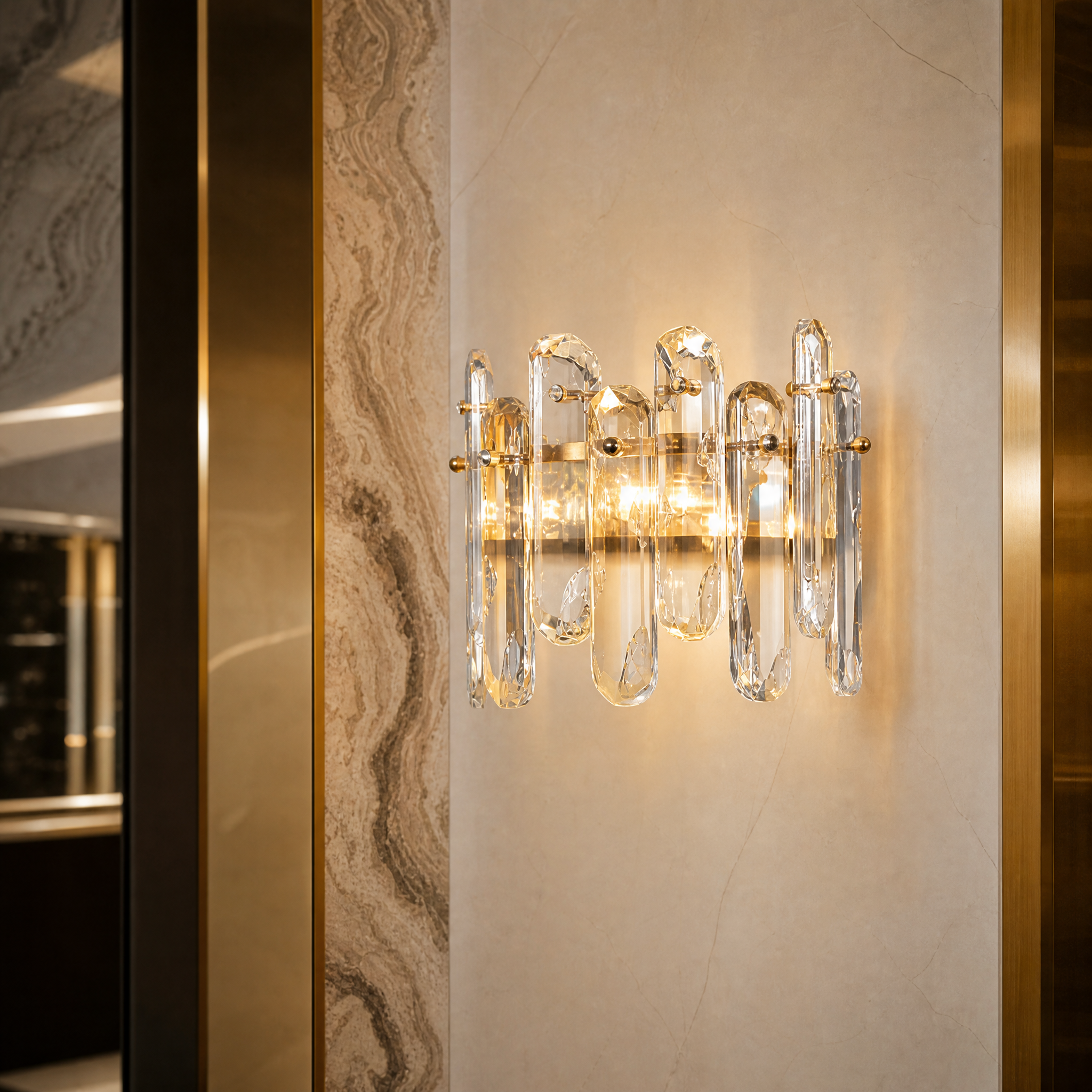Macro close-up shot of the Stellina wall light, focusing on the premium texture of the oblong luxury crystal.