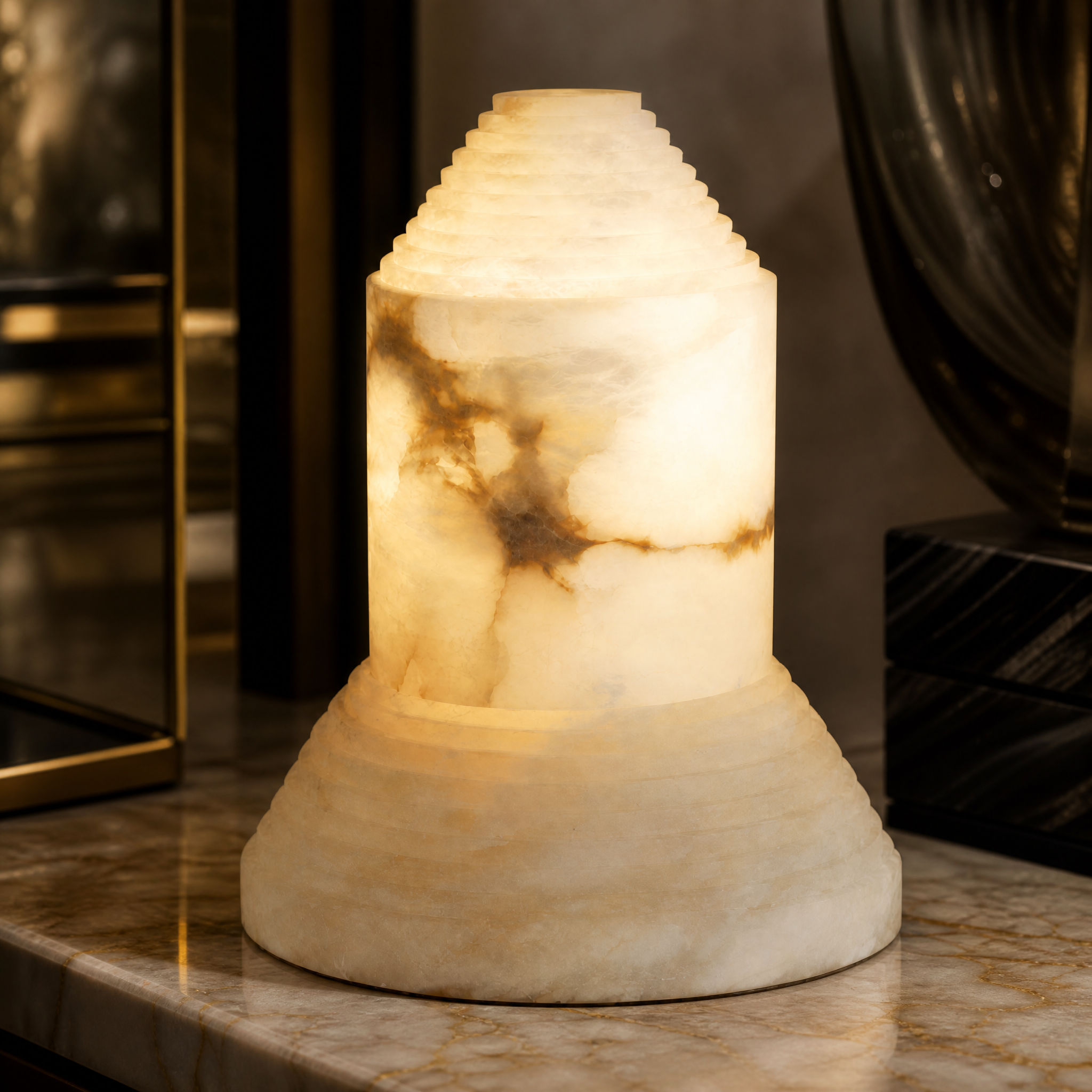 Macro view of the VORELLI Stratto Table Lamp, showcasing the premium tiered marble craftsmanship and intricate natural patterns.