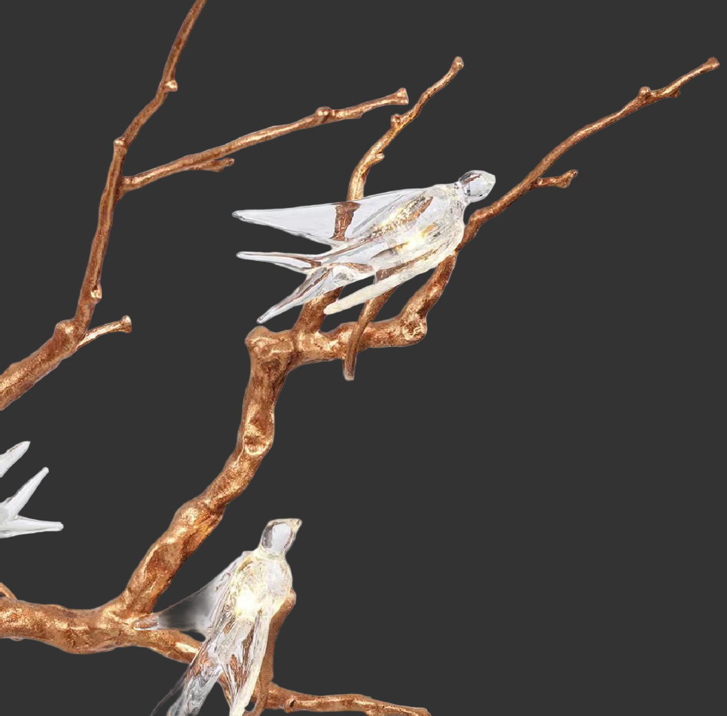 Crystal bird detail on sculptural branch chandelier by VORELLI®