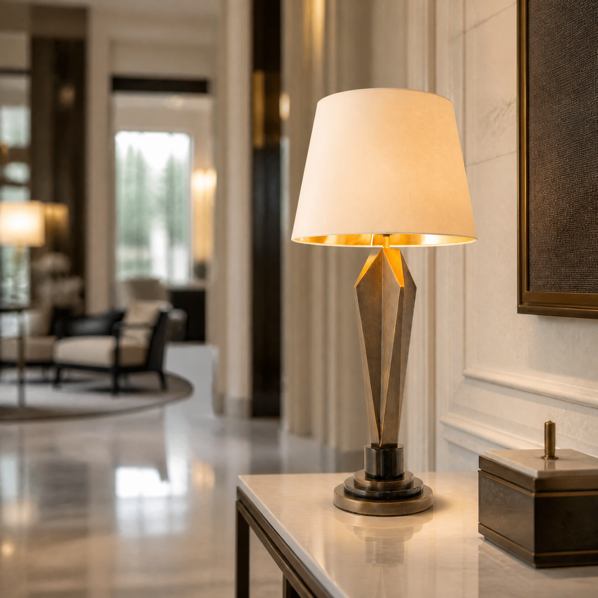 An upscale hospitality setting featuring the Valdorin brass table lamp casting a warm, inviting glow on a sophisticated reception desk.
