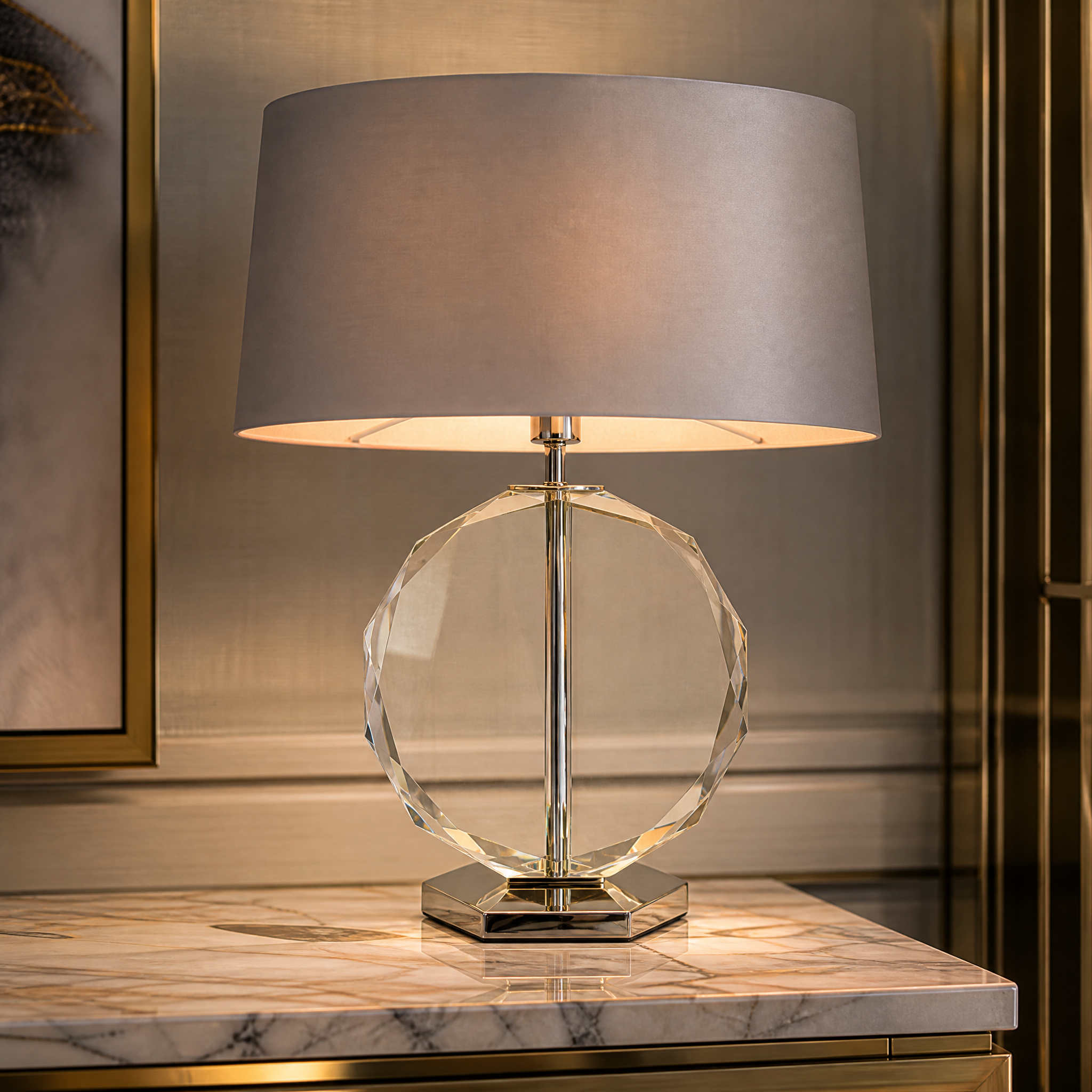 A macro close-up showcasing the detailed craftsmanship of the VORELLI Valmira lamp's sculpted clear crystal base and polished nickel accents.