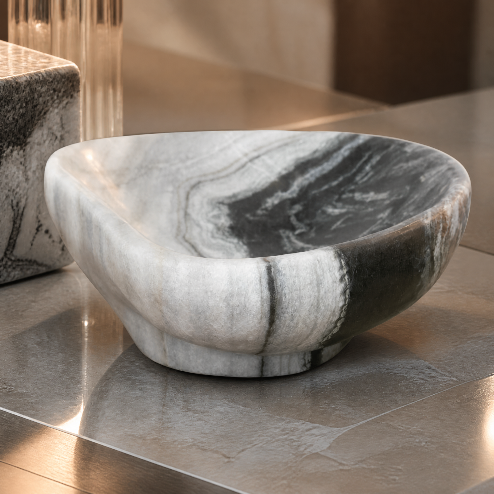 Macro closeup of the VORELLI Venezia Plate Decor highlighting the striking organic contrast of light and dark veining on polished marble.