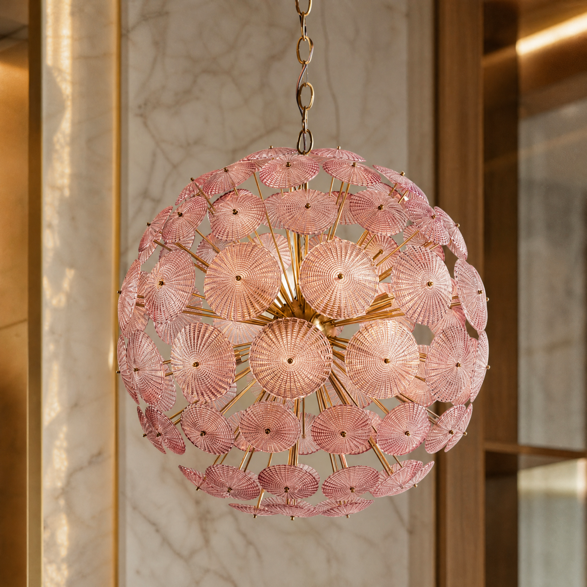 A detailed closeup shot of the VORELLI Vicenzino large pendant light, showcasing the intricate vibrant green glass elements of the dandelion sputnik design.