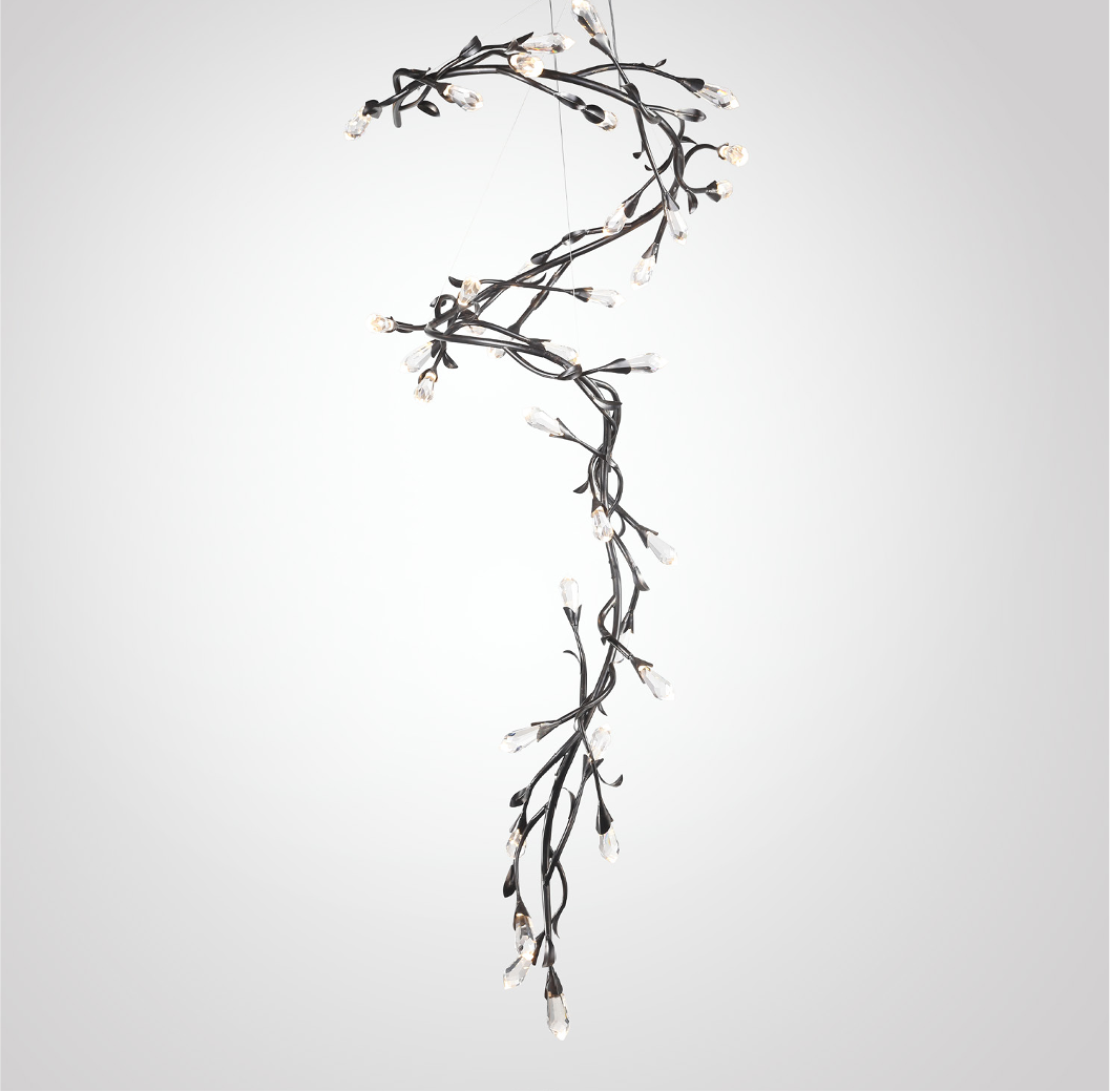 Luxury twisted branch chandelier with diamond-cut crystal drops by VORELLI®, ideal for stairwells and high ceilings in designer interiors.