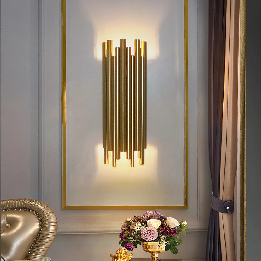 Modern wall light with vertical tube design creating warm ambient lighting in luxury bedroom