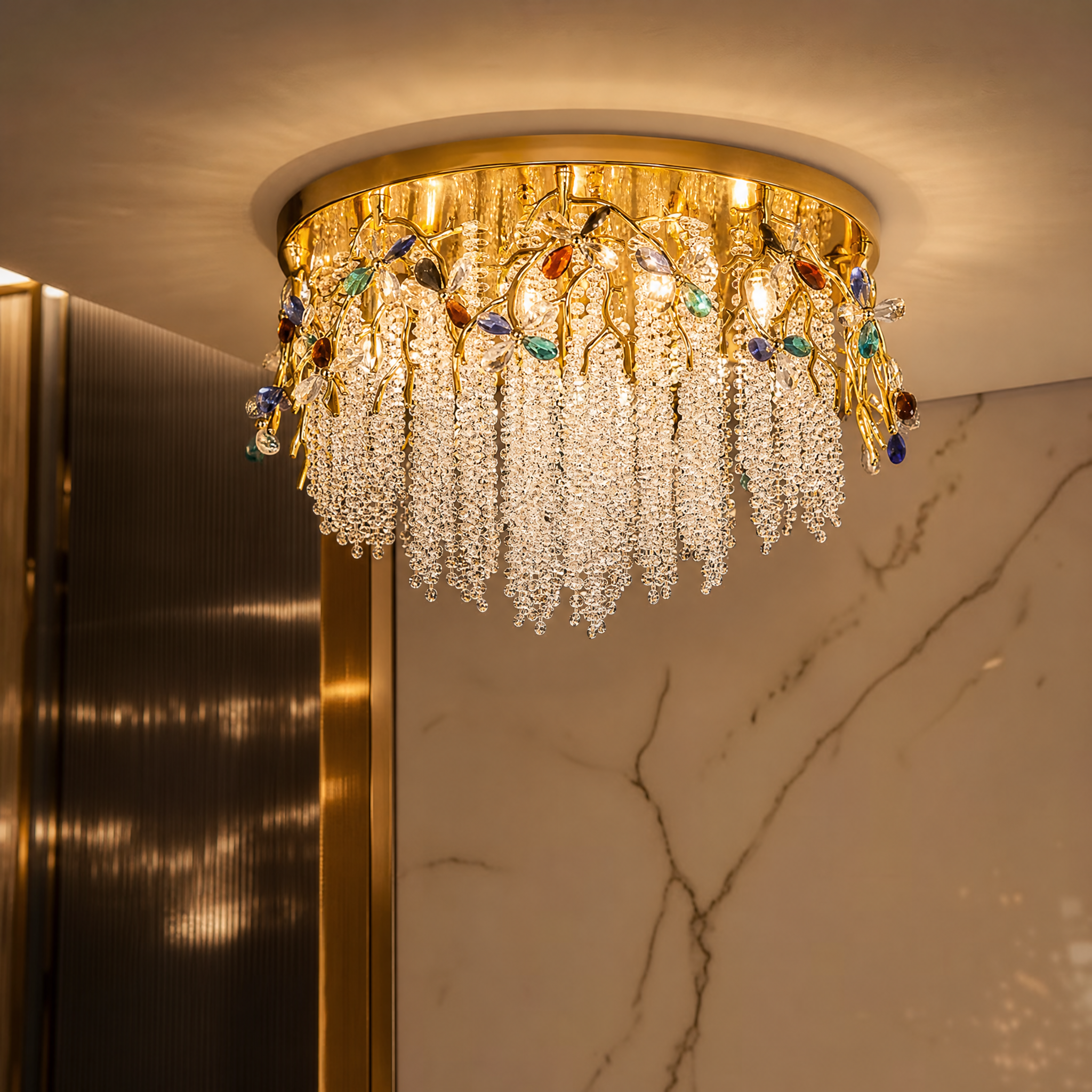 Macro closeup of the sculptural crystal detailing and cascading organic forms on the VORELLI Wisteria ceiling light.