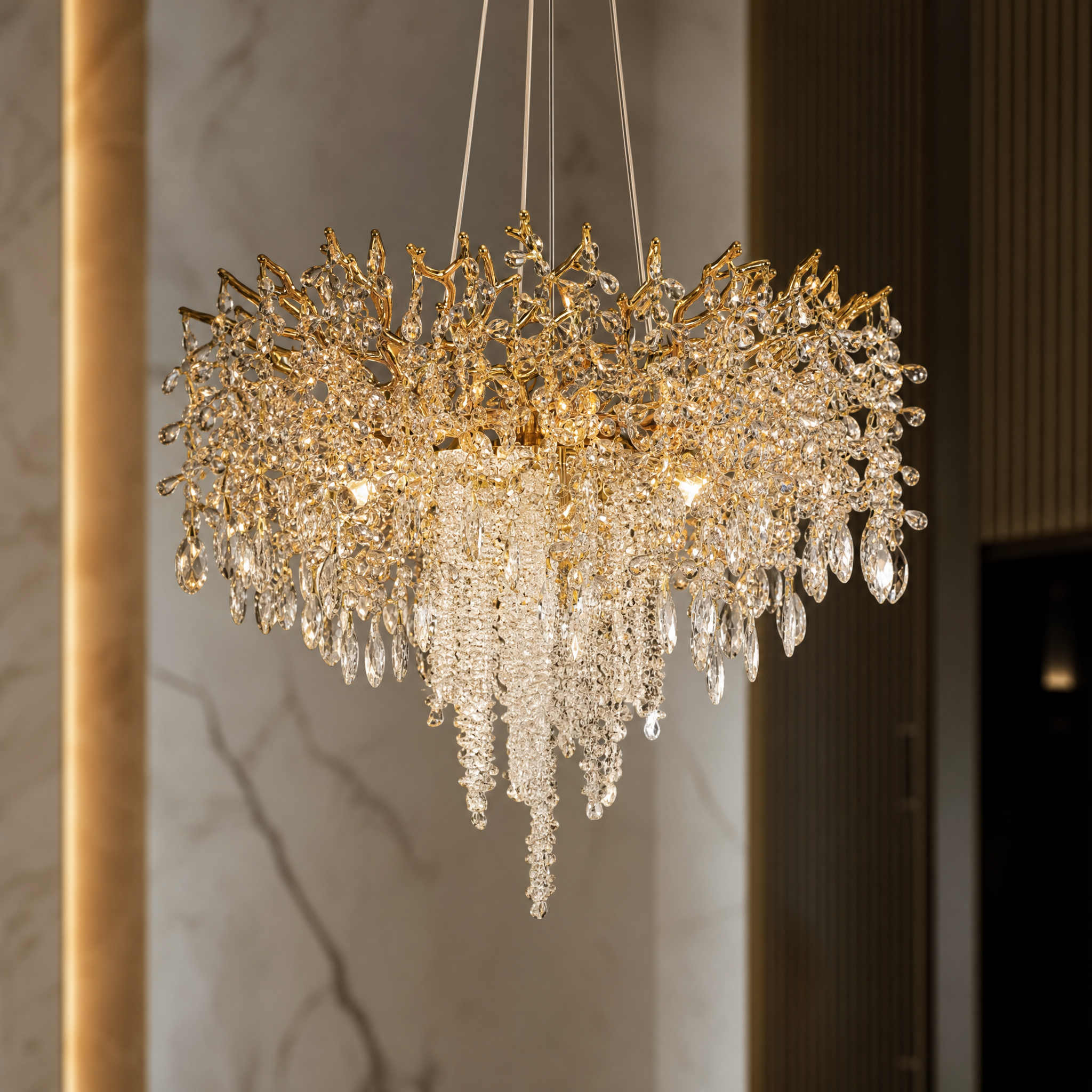 Macro closeup of the VORELLI Wisteria Circular Chandelier III, highlighting the sculptural branch forms and cascading crystal strands.