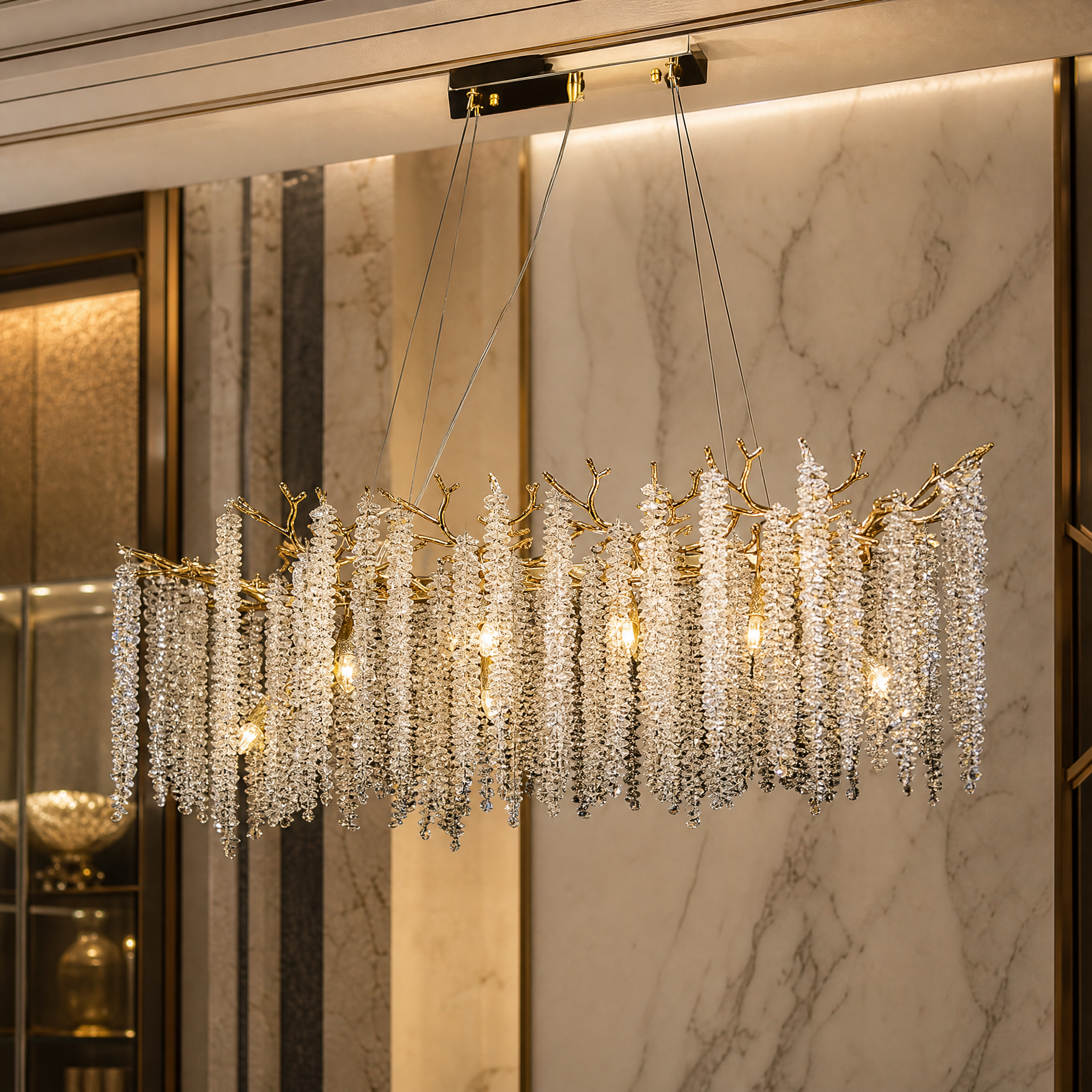 Detailed macro shot of the Wisteria Rectangular Chandelier's layered crystal strands and sculptural metalwork.