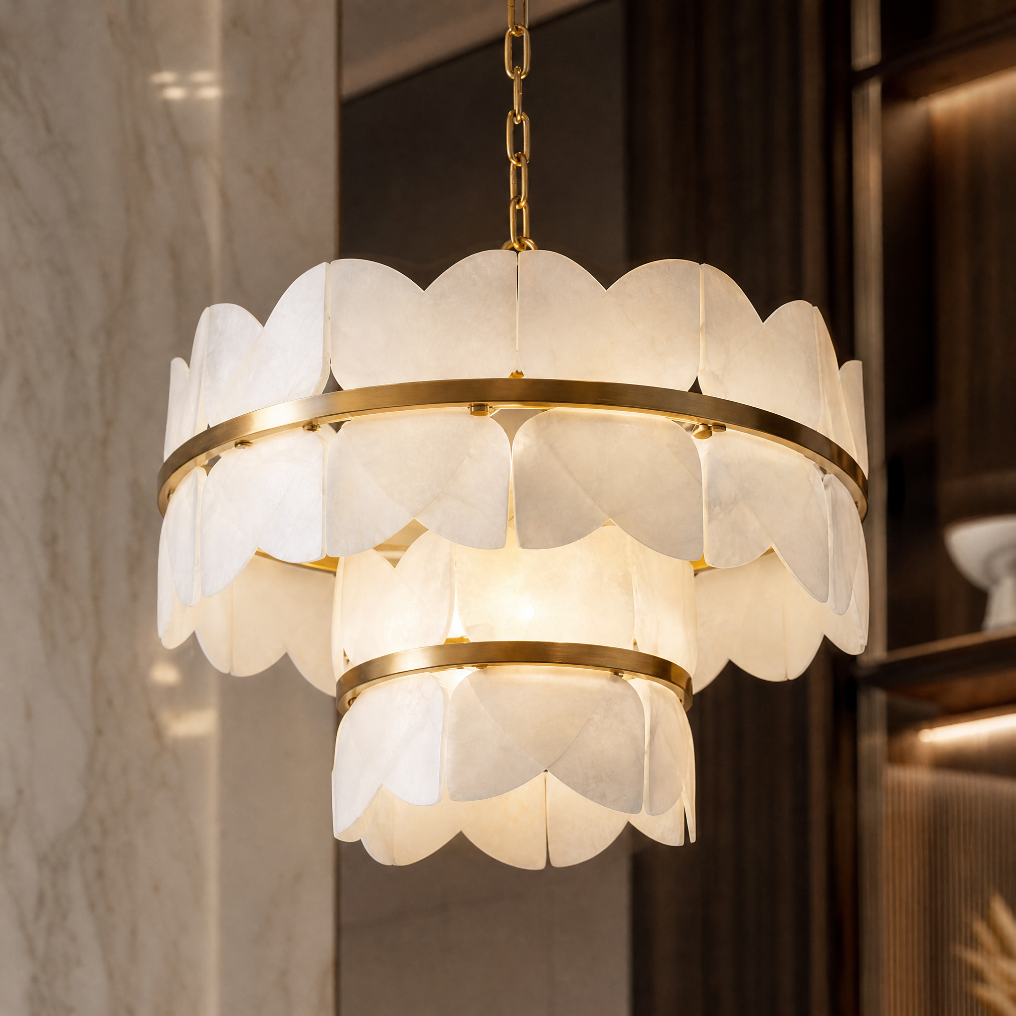 Detailed closeup macro shot of the VORELLI Xavier circular chandelier showcasing the premium veined marble and integrated LED illumination.