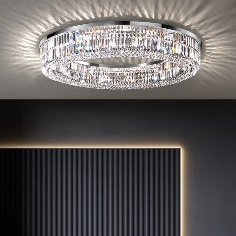 chartrons circular ceiling light with crystal bars and squares illuminated in modern interior