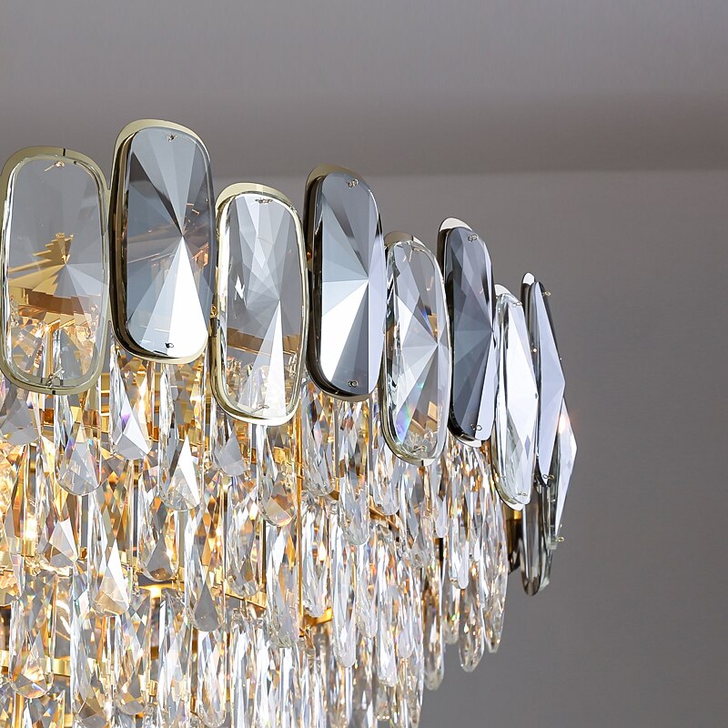 Angled view of the Edmond circular crystal chandelier showcasing layered diamond cut crystal detailing by VORELLI®