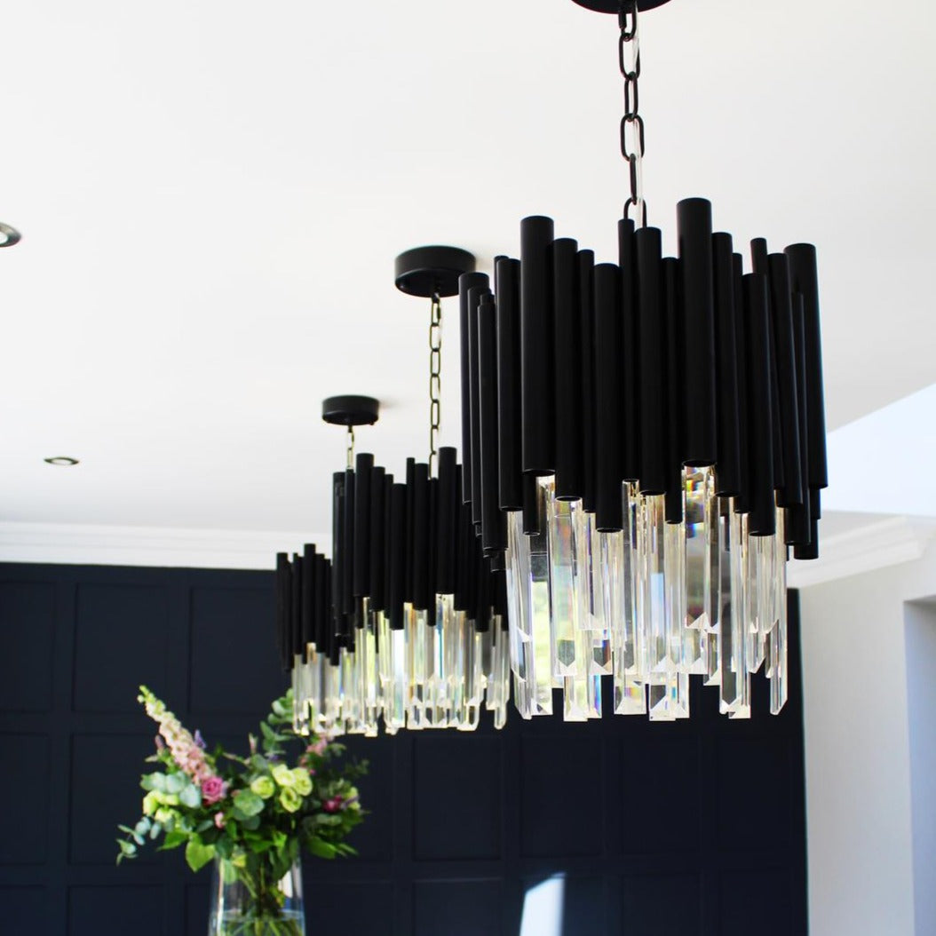 Close up of Gotham pendant with black tubing and crystal detail