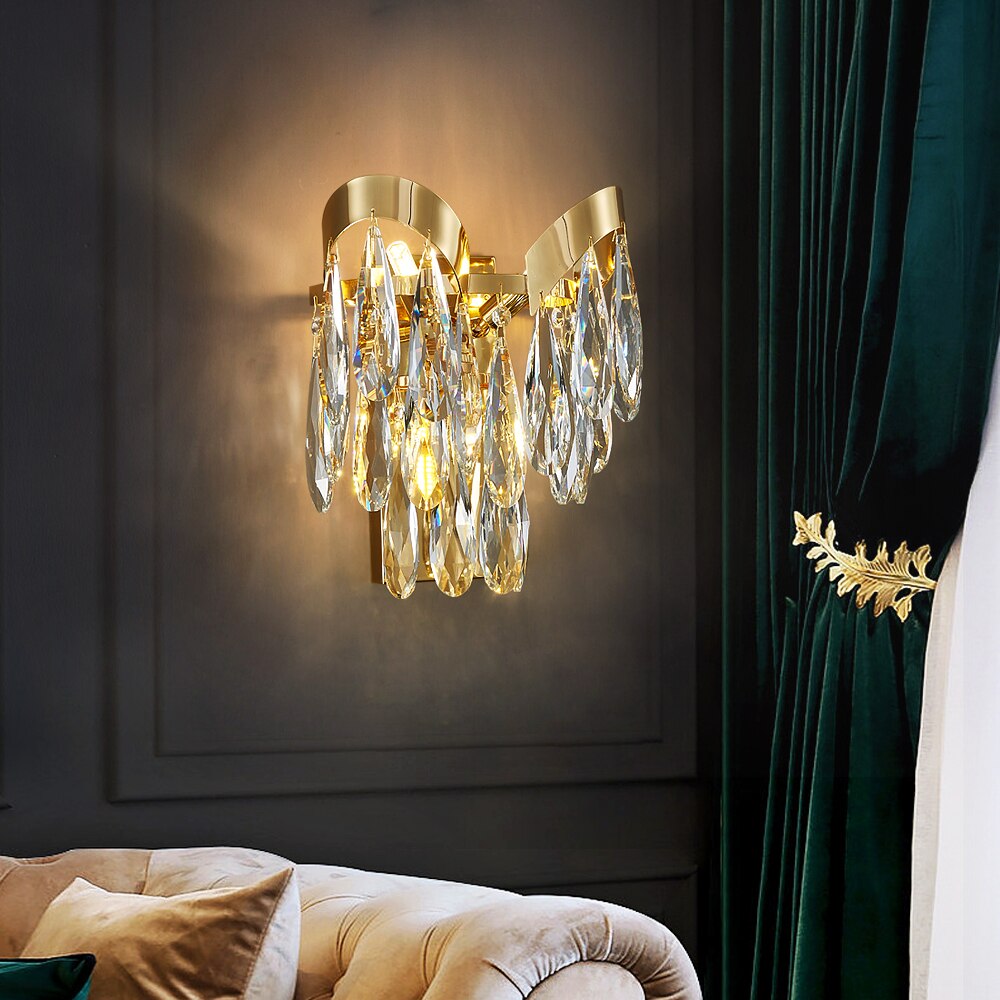 Isso Wall Light illuminating a refined contemporary interior with cascading crystal detail