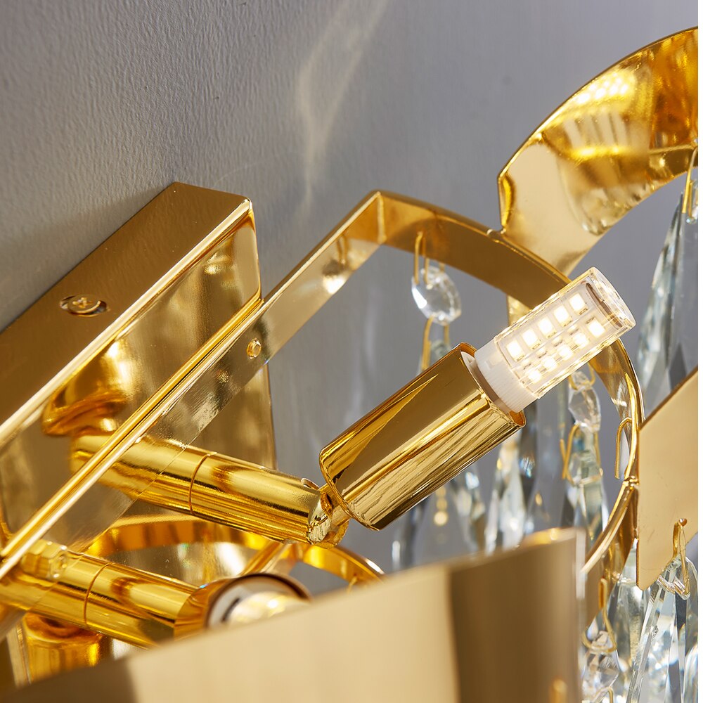 Close up of the Isso Wall Light sculptural frame and precision lighting components