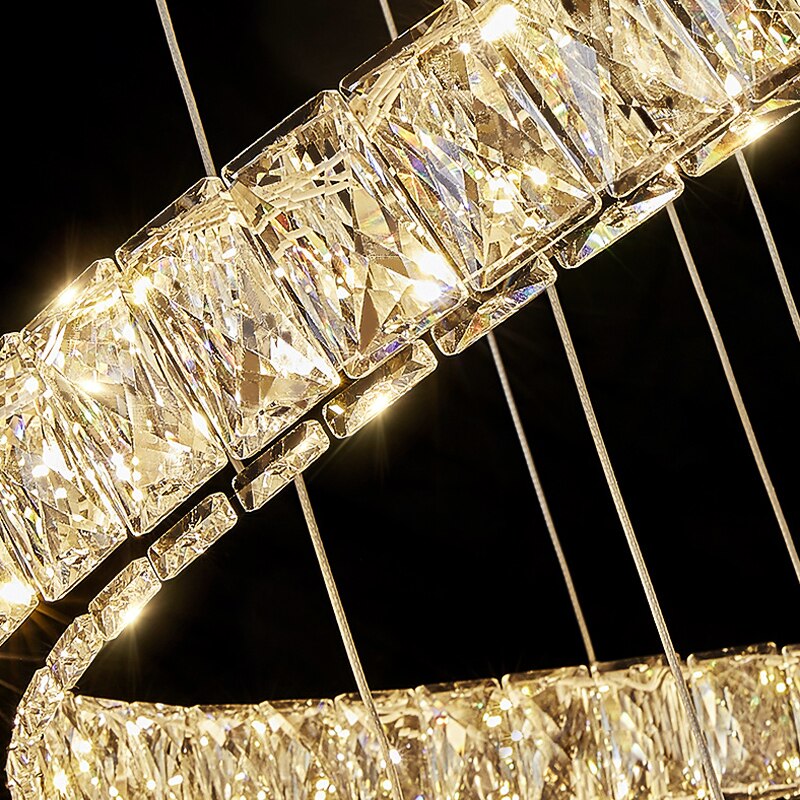 Close up of diamond cut crystal rectangles on spiral staircase chandelier