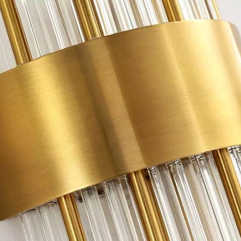 Close up of central metal band and vertical cylinder tubes on Piper Point wall light highlighting structured contemporary design