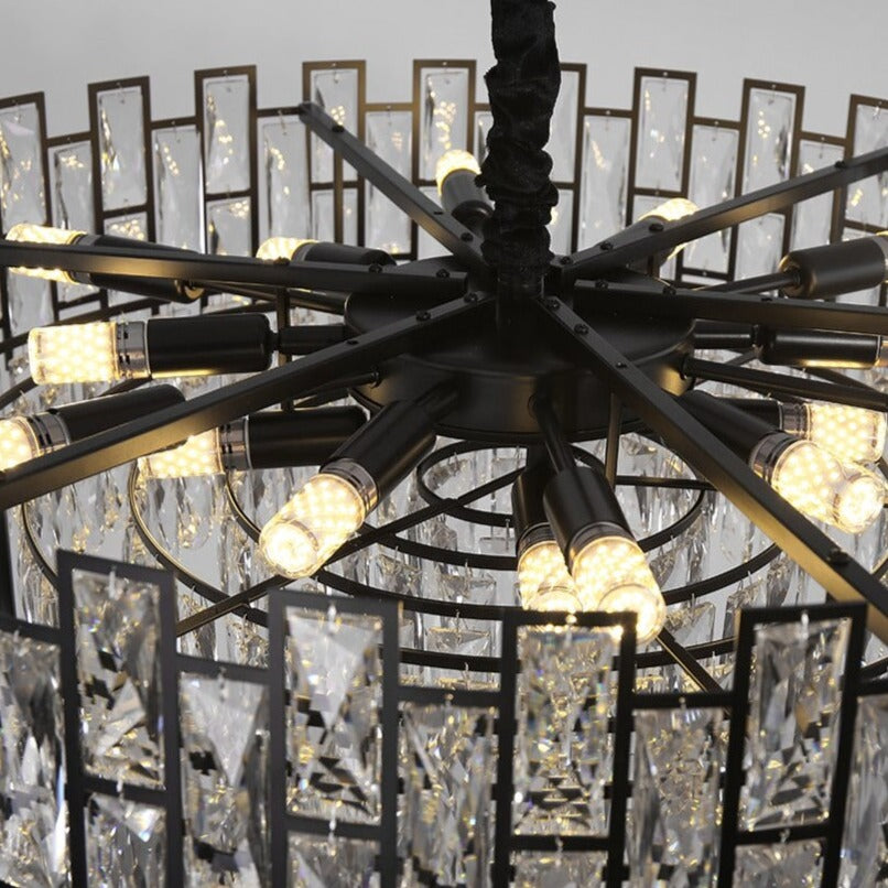 Close up angled view of Presidio circular chandelier highlighting faceted arch crystals within structured rectangular frame