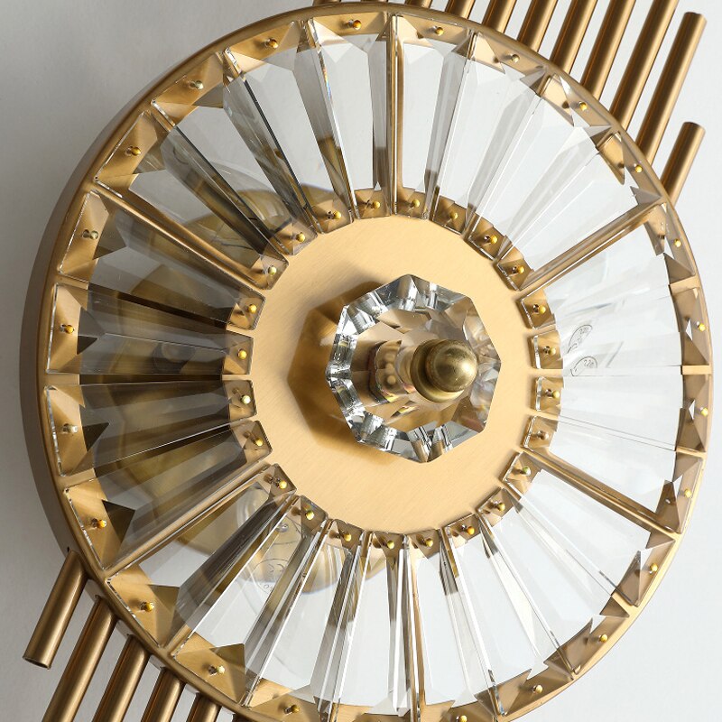 Close up of diamond cut crystal prisms forming centre of Santa Maria wall light