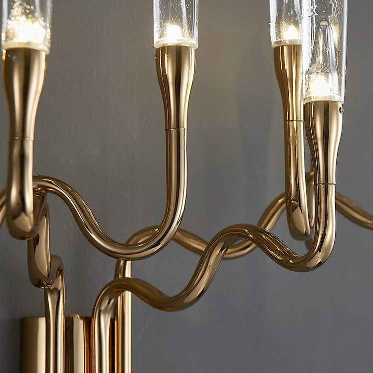 Detailed view of the sinuous brass frame on the Tiddington wall light