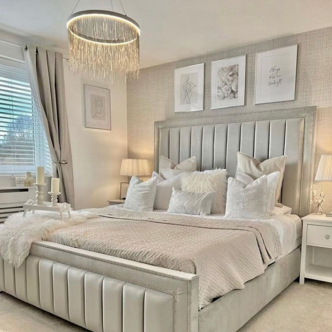 VORELLI® Adlington Circular Chandelier above a round bed in a luxurious neutral-toned bedroom
