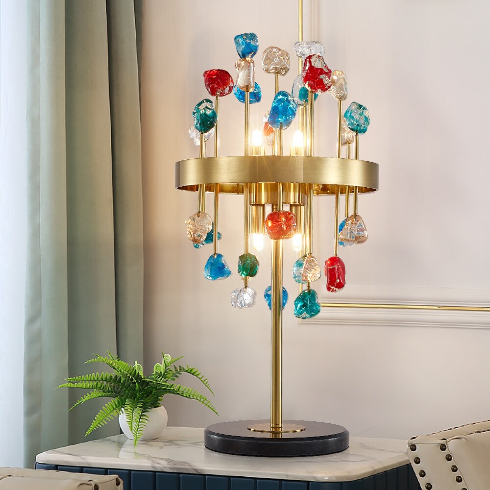 Alytus Table Lamp with colourful crystal spheres and a dark base displayed in a stylish modern interior.