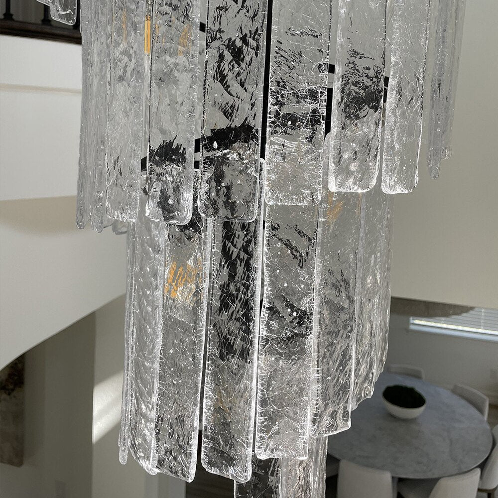 Close up of diamond cut crystal prisms on the Dunleavy spiral staircase chandelier