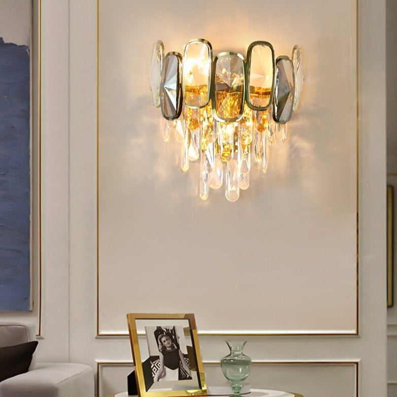 Designer Edmond wall light featuring diamond cut crystal elements on a feature wall