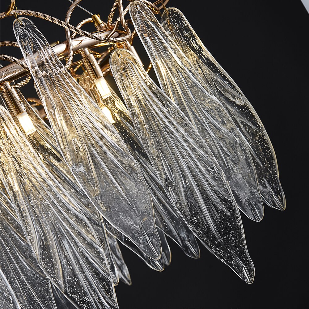 Leaf-shaped glass elements on the Larvotto circular chandelier by VORELLI®