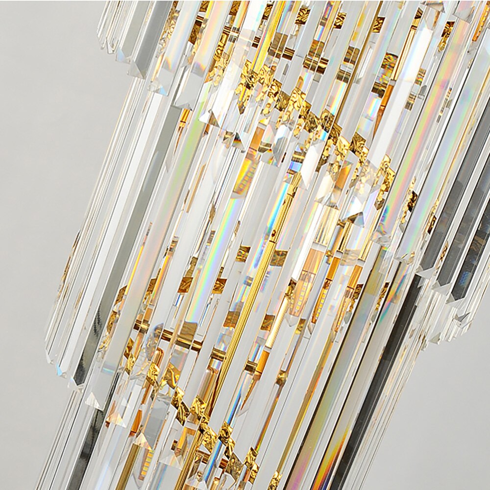 Close-up crystal detail of the VORELLI® Manhattan spiral staircase chandelier highlighting precision-cut cascading crystals and refined luxury craftsmanship.