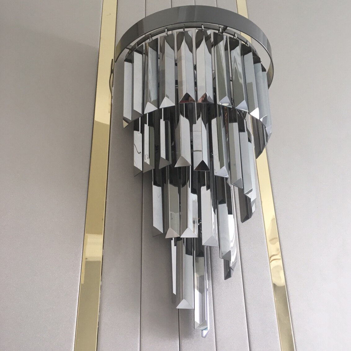 Tiered crystal bars on the VORELLI Margoux wall light showcasing layered design brilliance and refined craftsmanship