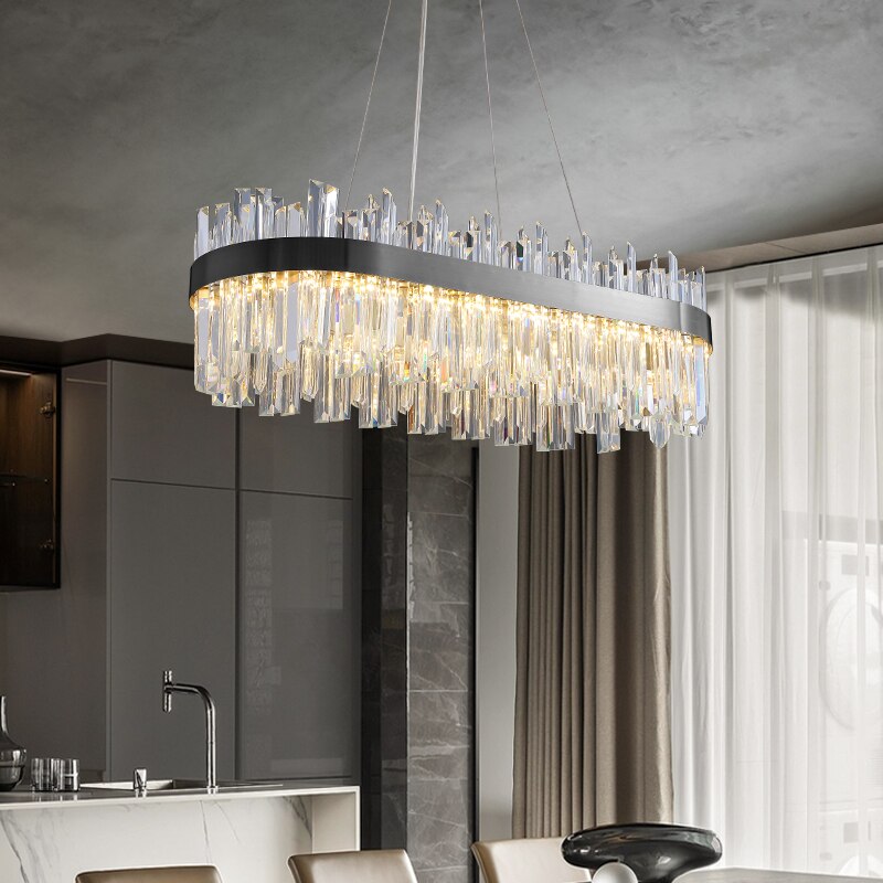 VORELLI Medina rectangular chandelier with crystal bars and stainless steel frame creating a modern luxury statement above a dining space