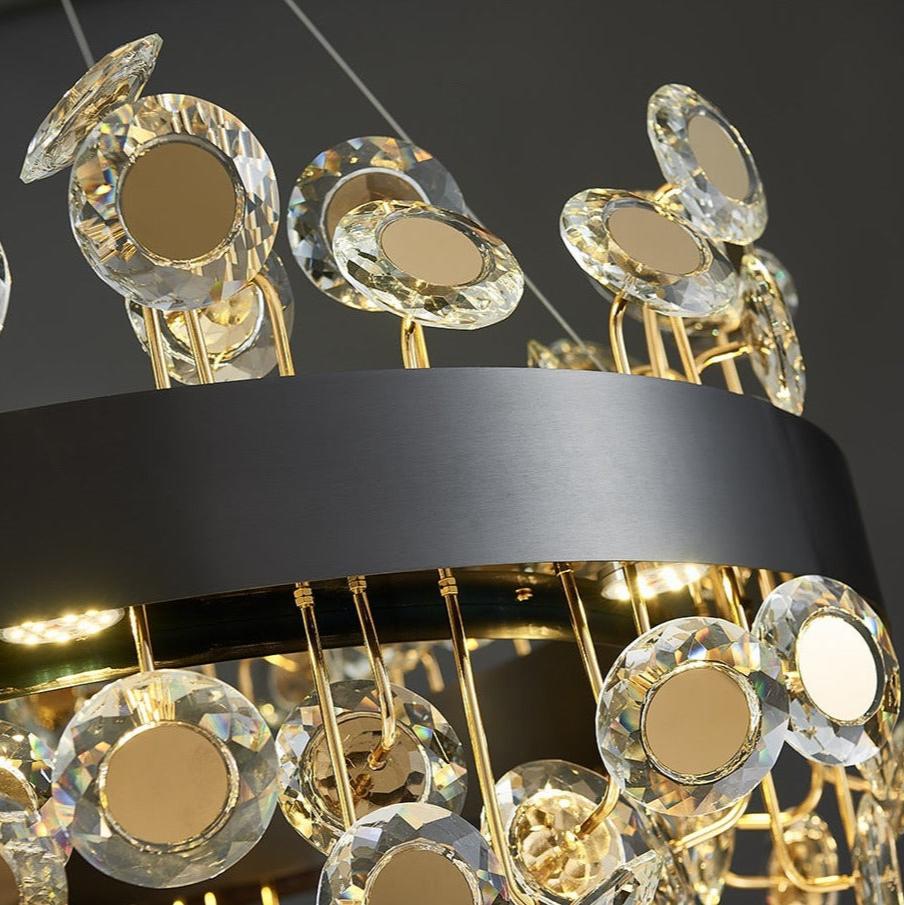 Detailed view of structured circular frame and layered crystal discs on VORELLI® Patara circular chandelier